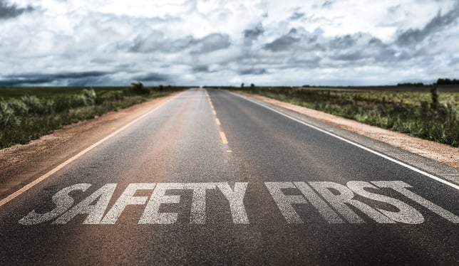 Safety First written on rural road | ESB Professional / Shutterstock